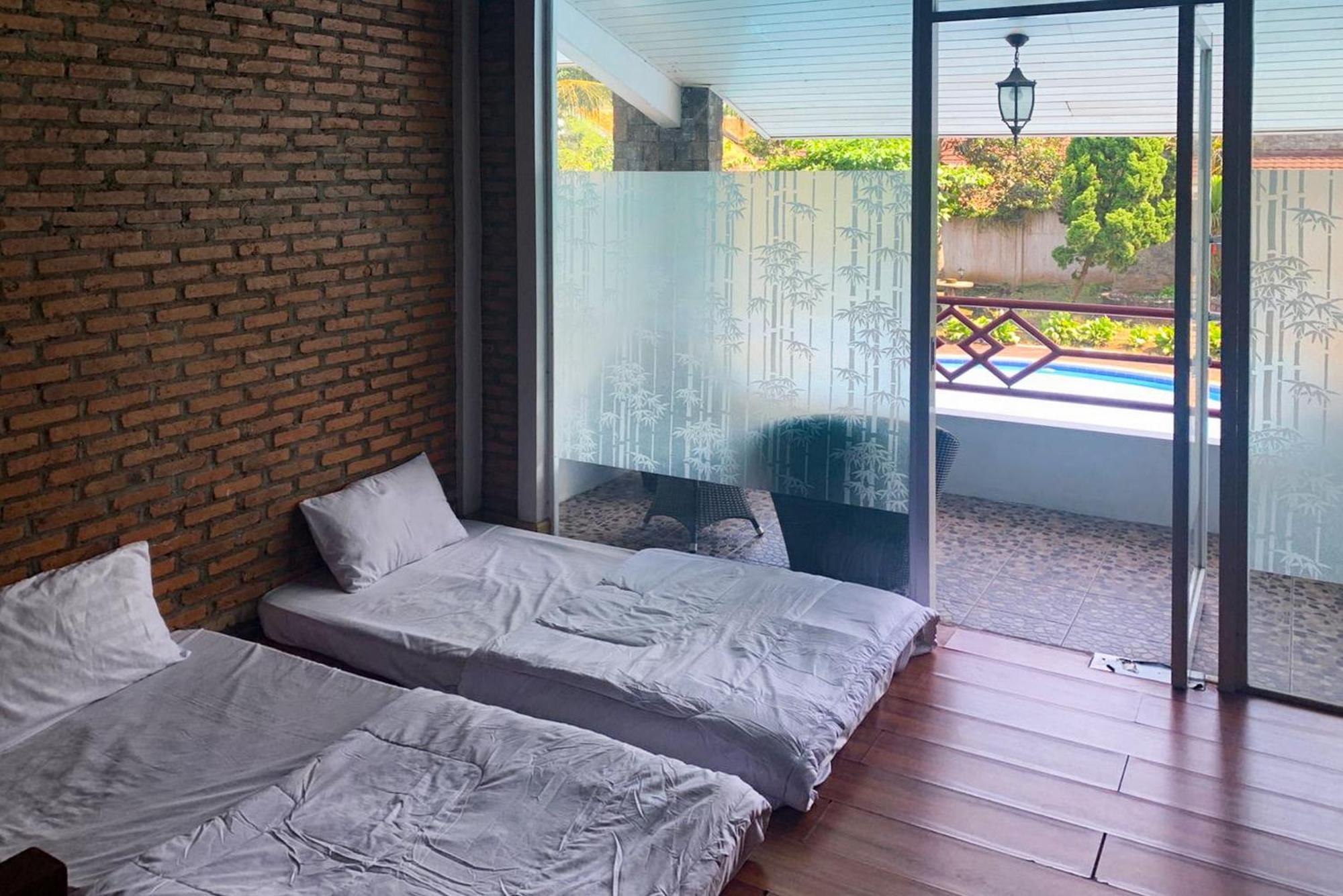 Urbanview Hotel Villa Q Gisting Bandjarnegeri 外观 照片